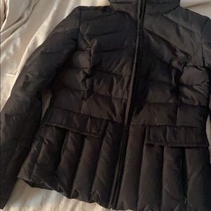 Zip up puffer jacket. insulated and warm.